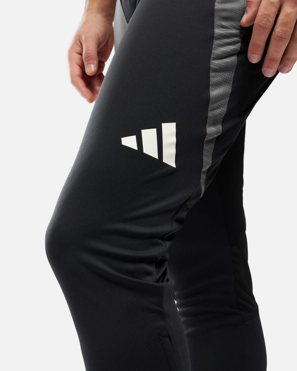 Pantalon d'entrainement Manchester United 2024/2025 - Noir/Rouge