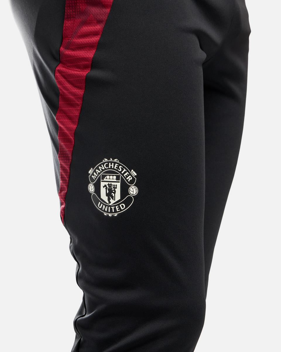 Pantalon d'entrainement Manchester United 2024/2025 - Noir/Rouge